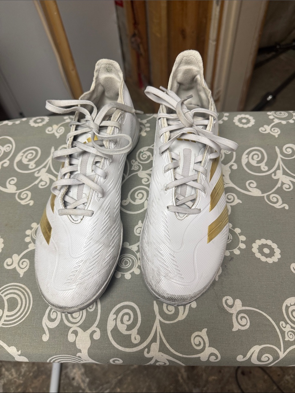 White and Gold Athletic Cleats